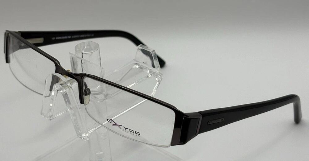 Oxydo Eyewear Rectangular Glasses Black Unisex 135 Temple